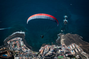 Paragliding over Caleta, aerial view, Tenerife, Canary Islands, Spain Paragliding over Caleta, aerial view, Tenerife, Canary Islands, Spain